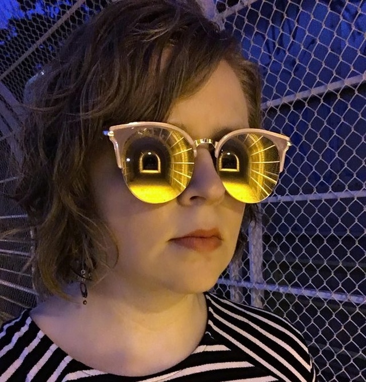 The reflection of this tunnel in the mirrored sunglasses