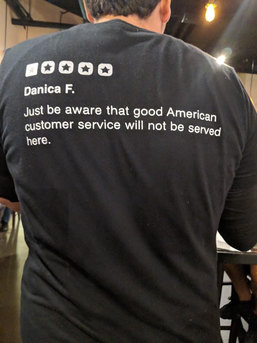 yelp shirt - Danica F. Just be aware that good American customer service will not be serve here.