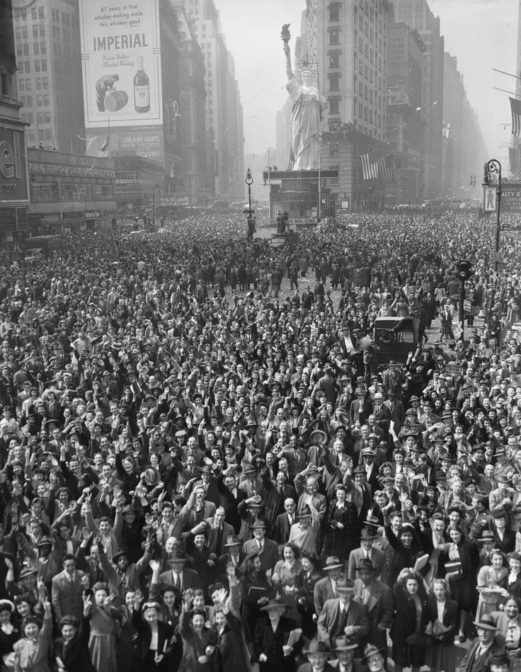 Crowd in Times Square, New York City celebrating the surrender of Germany, May 7th, 1945.