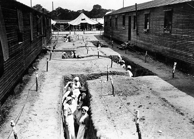 Nurses in their bomb trenches between hospital wards. France 1918