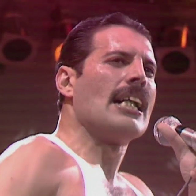 Freddie Mercury of Queen held a party in New Orleans in 1978, which featured nude waiters and waitresses, a man biting heads off live chickens, naked models wrestling in a liver pit, and dwarves walking around with trays of cocaine strapped to their heads. Fortified by “lines of marching powder as long and as thick as your grandmother’s arm”, the guests are free to choose from a menu of exotic diversions.

The hotel ballrooms, made up to resemble labyrinthine jungle swamps, are swarming with magicians, Zulu tribesmen, contortionists, fire-eaters, drag queens and transsexual strippers. Drinks are served by naked waiters and waitresses who politely request that any tips are placed not on trays but in bodily crevices.

Naked dancers cavort in bamboo cages suspended from ballroom ceilings. Nude models of both sexes wrestle in huge baths of shimmering, uncooked liver, while 300lb Samoan women lounge on banquet tables, smoking cigarettes from various orifices.

As a bonus, visitors to the hotel’s grand marble bathrooms are orally serviced by prostitutes of both sexes.

“Most hotels offer their guests room service,” quips a passing Mercury. “This one offers them lip service.”