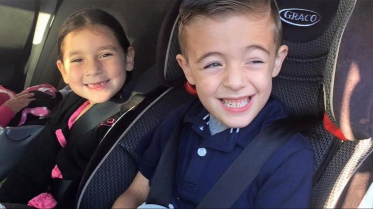 This boy made a 911 call after dad drove through a red light.