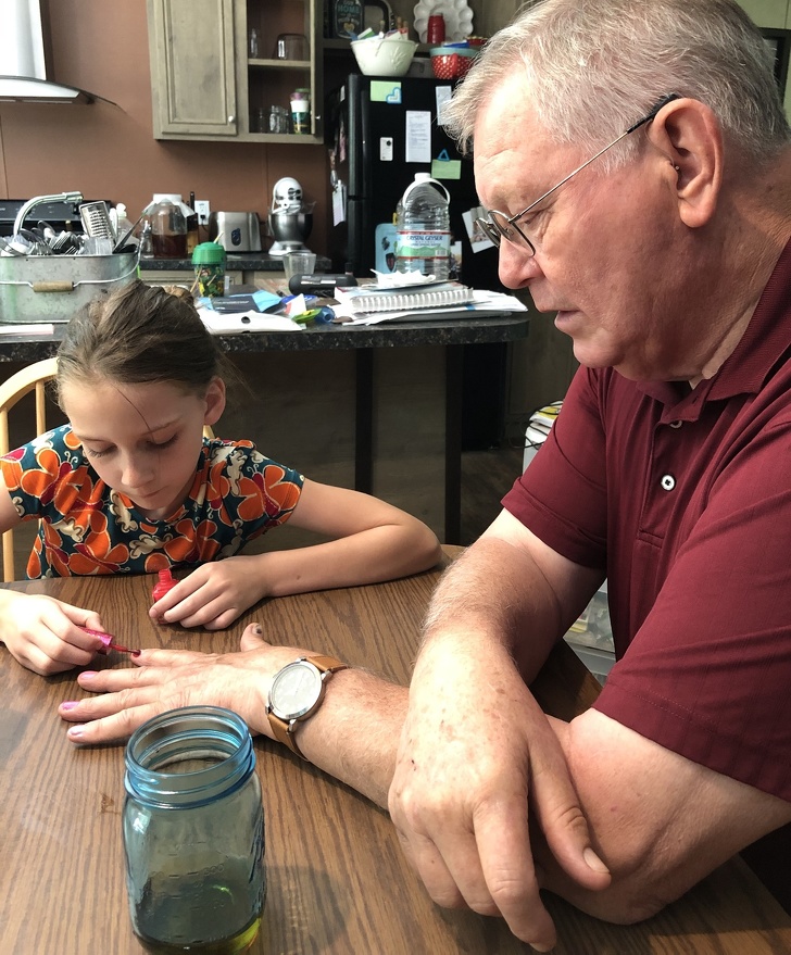 “My grandpa letting my little sister practice her nail polishing on him.”