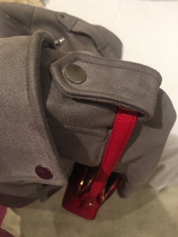 “It’s taken me 18 years to find out that the weird shoulder buttons on jackets are to hold your bag in place so it doesn’t fall off. Who knew?!”