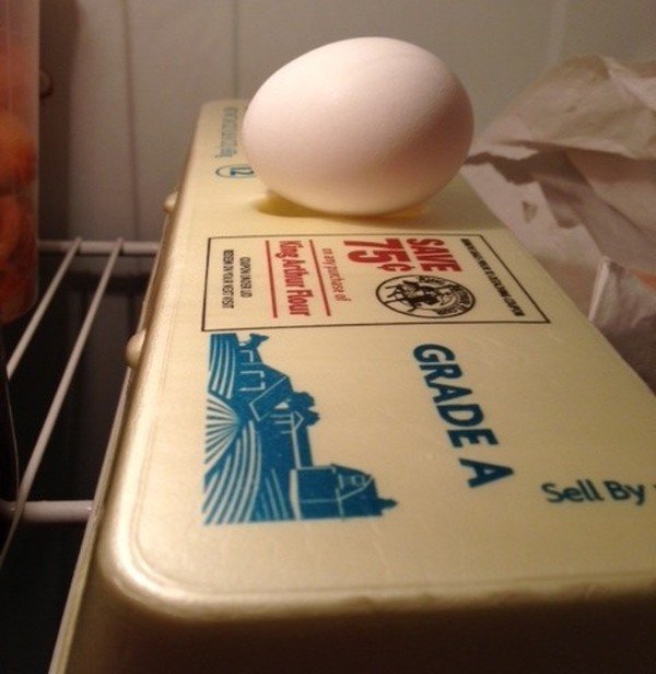 The indent on top of egg cartons are for the last egg from your old cartons.