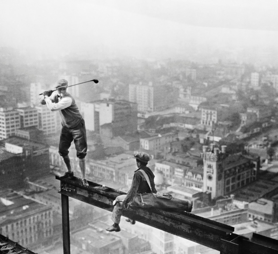 Playing golf on a building under construction in Los Angeles, 1927