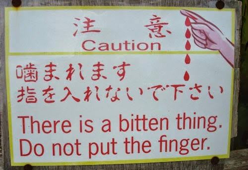 engrish signs - Caution There is a bitten thing. Do not put the finger.