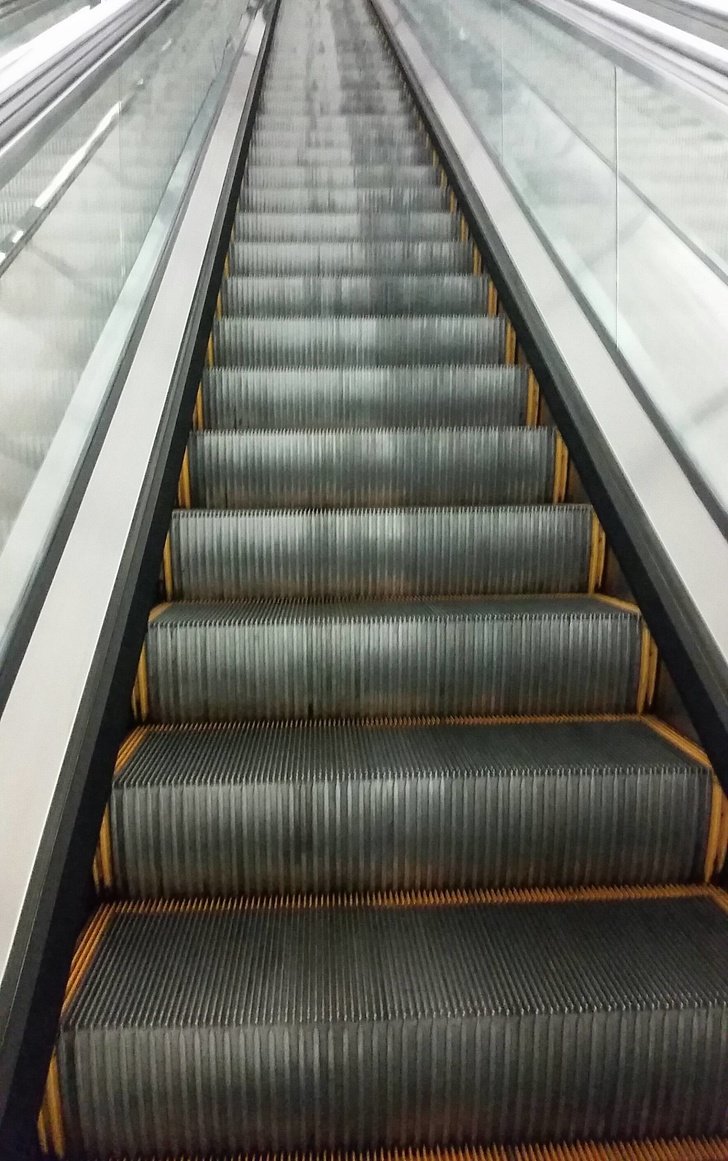 This escalator is much dirtier on the side that people walk up compared to the side people stand on.