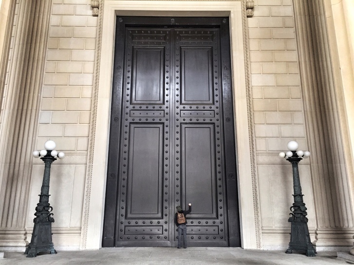 A huge door with a human for scale.