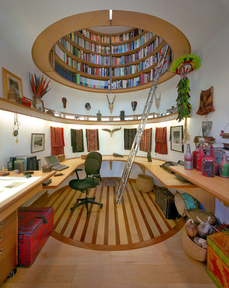 Be creative and make your home office look like a secret hideaway with a ceiling library.