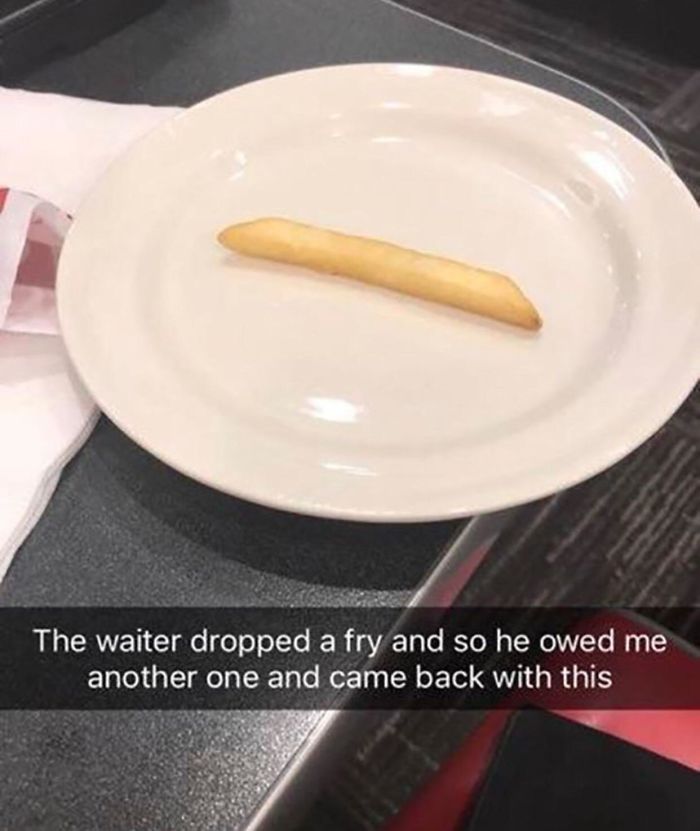 one fry on a plate - The waiter dropped a fry and so he owed me another one and came back with this
