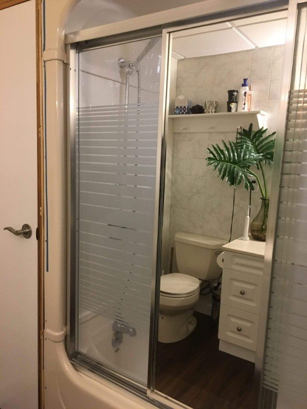 This mirror makes it look like the entire bathroom is in the tub.