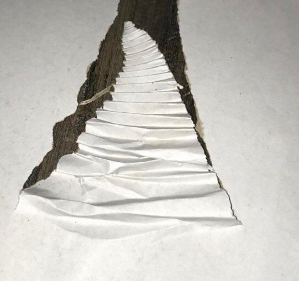 “Ripped paper looks like endless staircase.”