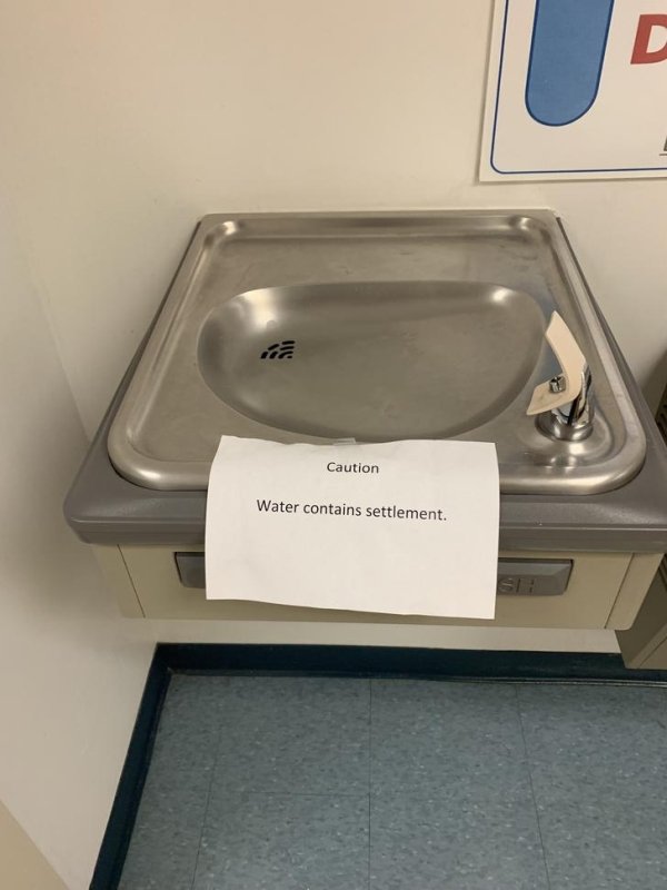 bathroom sink - Caution Water contains settlement.
