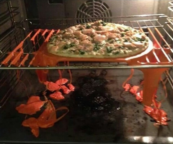 His friend put the pizza in the oven but forgot to remove the cutting board. Imagine who’s cleaning this up...