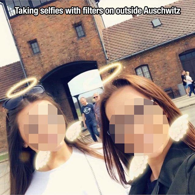auschwitz selfie - Taking selfies with filters on outside Auschwitz