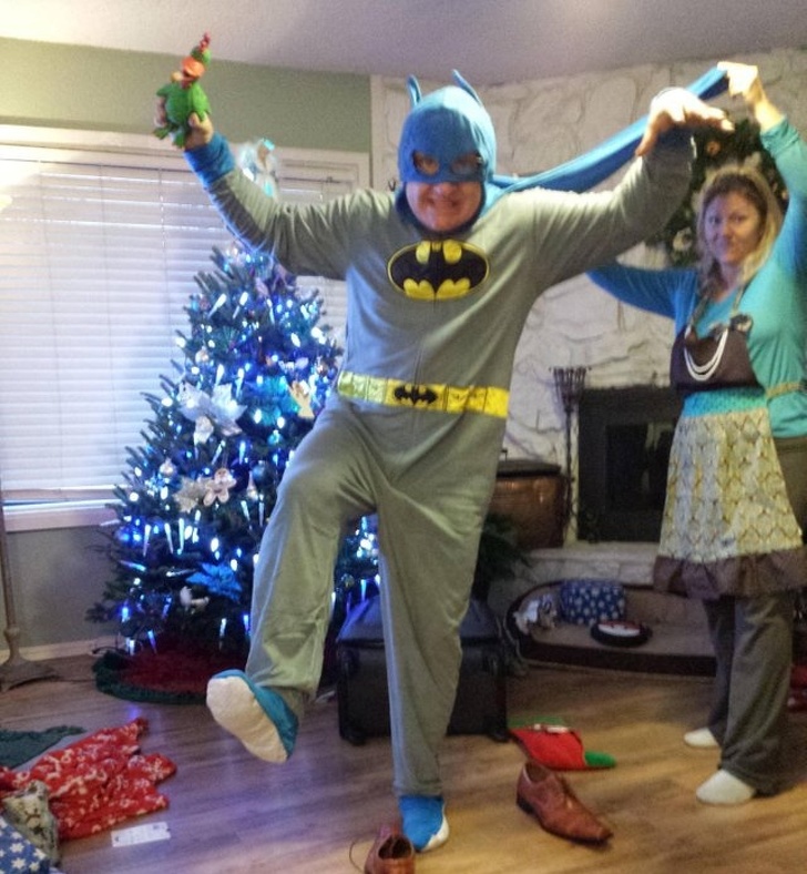 “My dad made my mom hold his cape for his Christmas jammies pic.”
