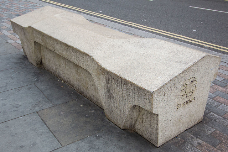 This is a Camden bench. It limits 22 unwanted behaviors: sleeping outside, trashing, skateboarding, drug dealing, theft, graffiti, and so on.