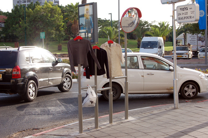 Road fences “wearing” clothing