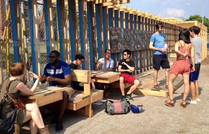 Brooklyn citizens turned a fence into a place to chat.