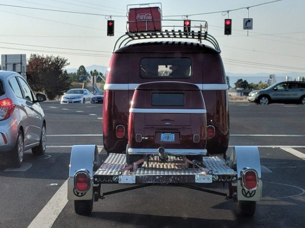 This van is towing a mini version of itself.