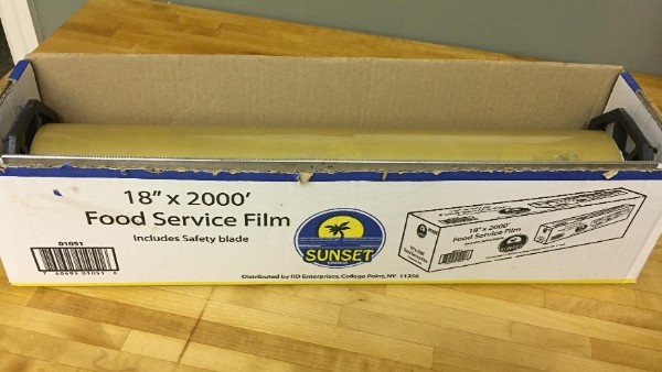 This box of cling film has a picture of a box of cling film that has a picture of a box of cling film that has a picture of a box of cling film.