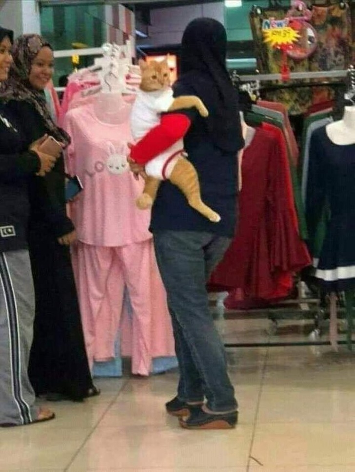 Nothing unusual, just a woman who’s shopping with her kid. Wait a minute...