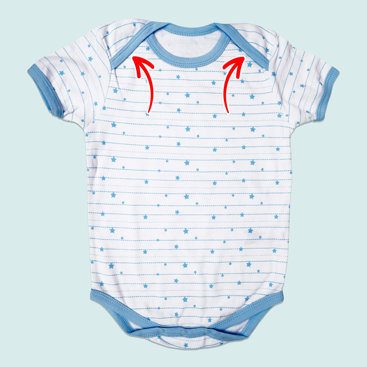 These flaps are actually useful if you want to easily get a baby out of a messy onesie. They help you pull the onesie downward, over the baby’s legs rather than over their head.
