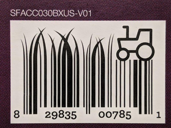 Barcode on my box getting mowed by tiny tractor.