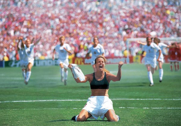 1999 – Brandi Chastain scores the game winning penalty kick in the World Cup.
She became a celebrity after this event, but there was way too much blowback for her celebration. Whoop-de-doo, a black sports bra.