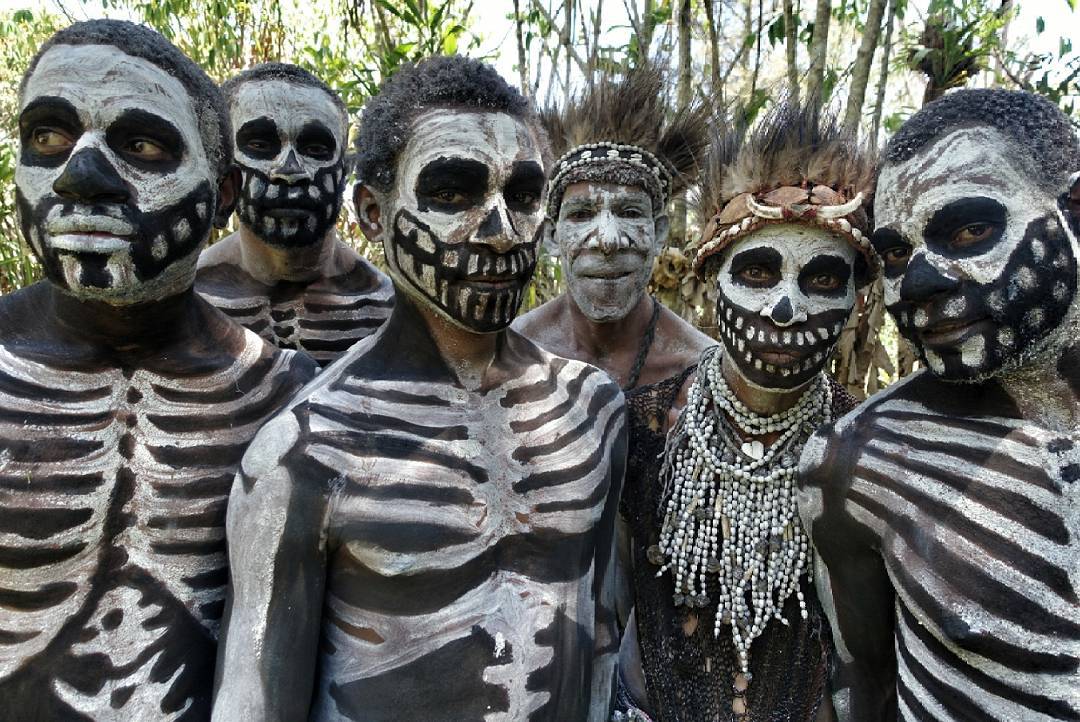 The Chimbu, an isolated tribe in Papua Nee Guinea, dress in skeleton body paint to intimidate their enemies