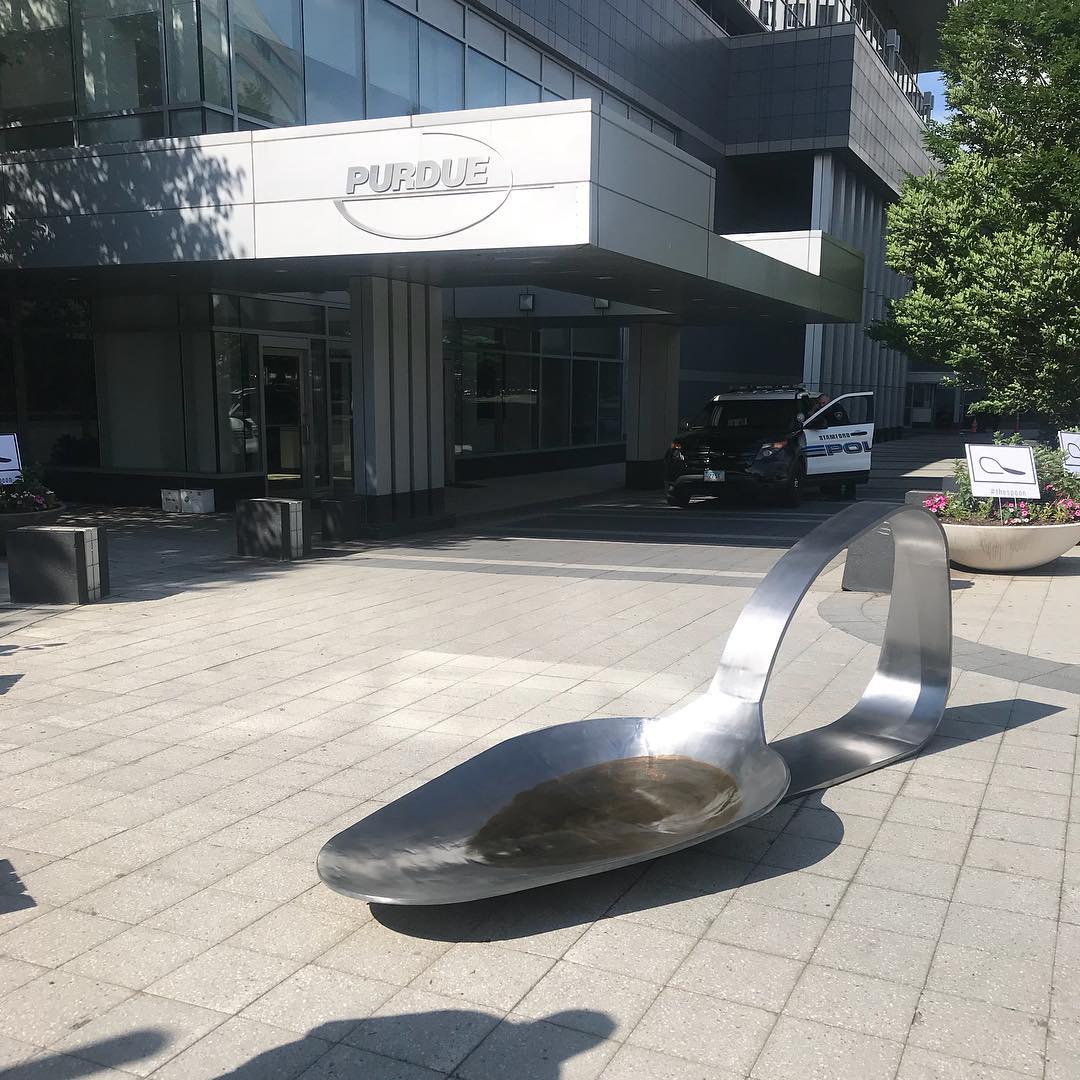 A large sculpture of a spoon that was placed outside Purdue Pharma headquarters as part of a protest against the opioid crisis