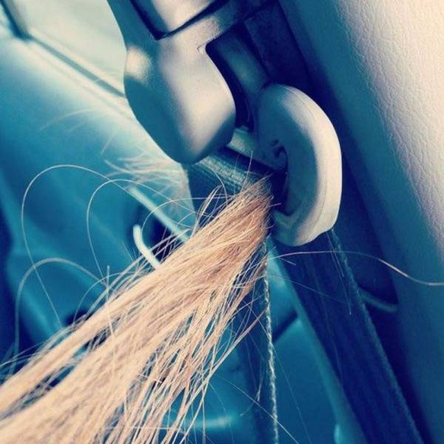 hair stuck in seat belt