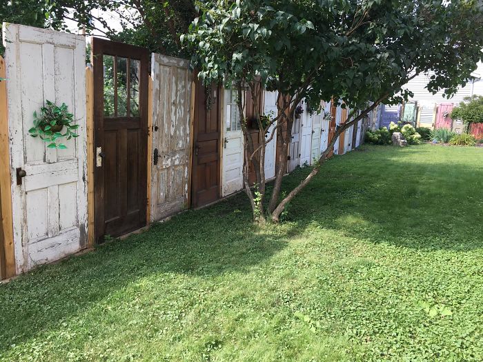 This Guy's Fence Is Made From Random Doors