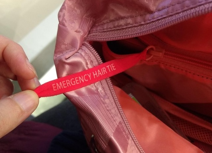 “My bag has an elastic zipper that can be used as an ‘emergency’ hair tie.”