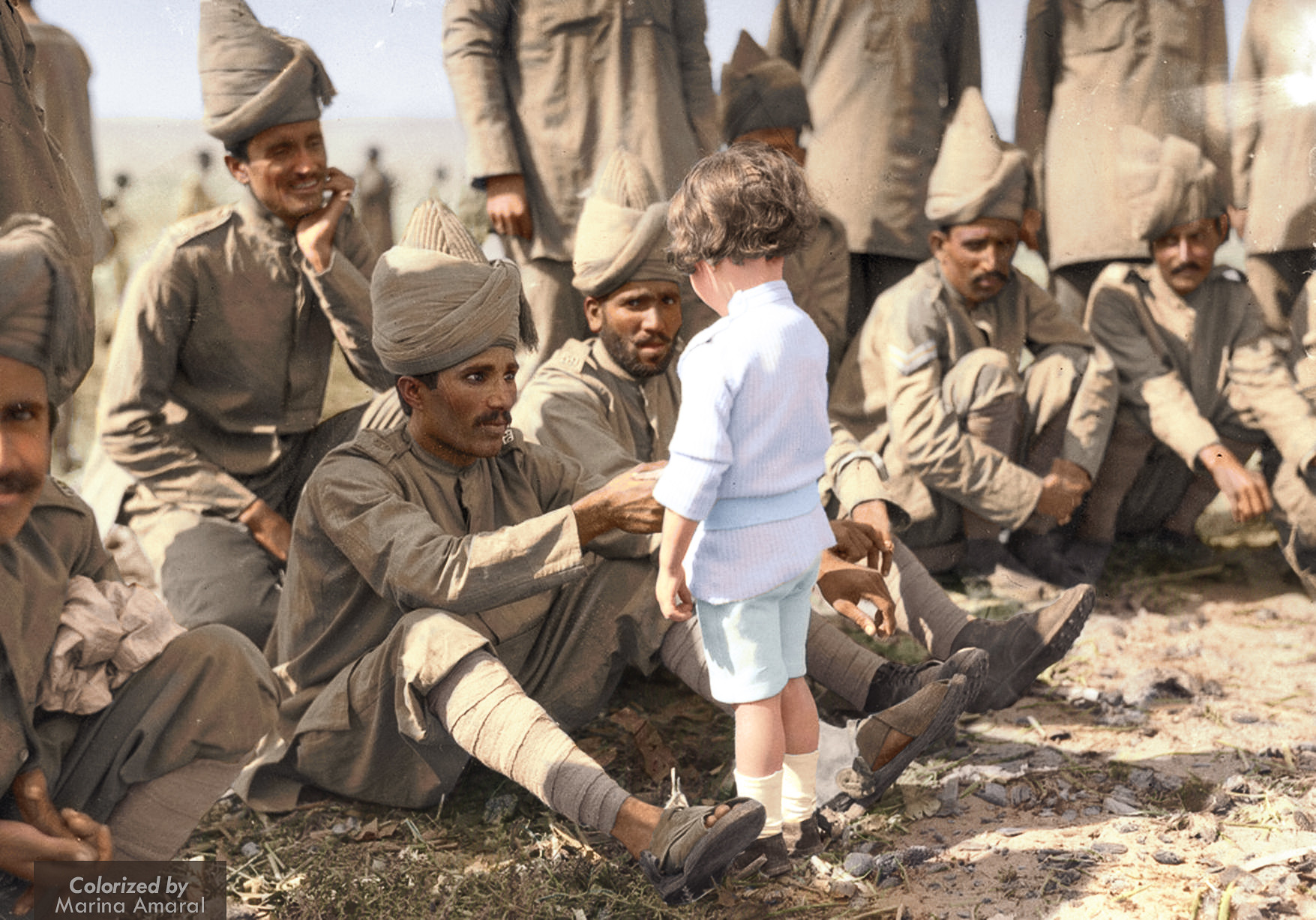 Indian Colonial troops meet a young British Boy during the First World War.