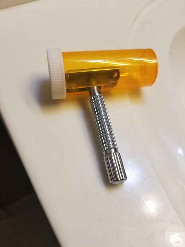 A child safety lock for a razor