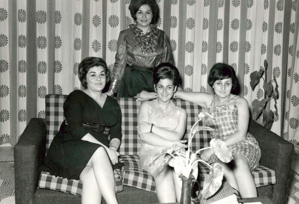 The Saudi Arabian fashion designer, Parveen Shaath, seated left on the couch, with her friends in Riyadh, Saudi Arabia in the 1960s. Before the harsh laws imposed on women in Saudi Arabia in the 1980s.