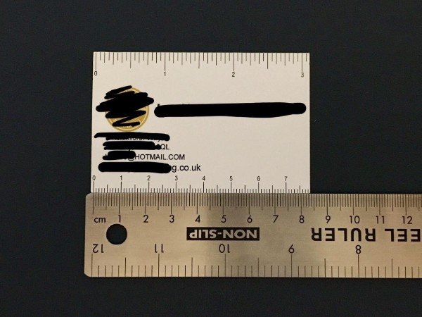This business card has a completely useless ruler.