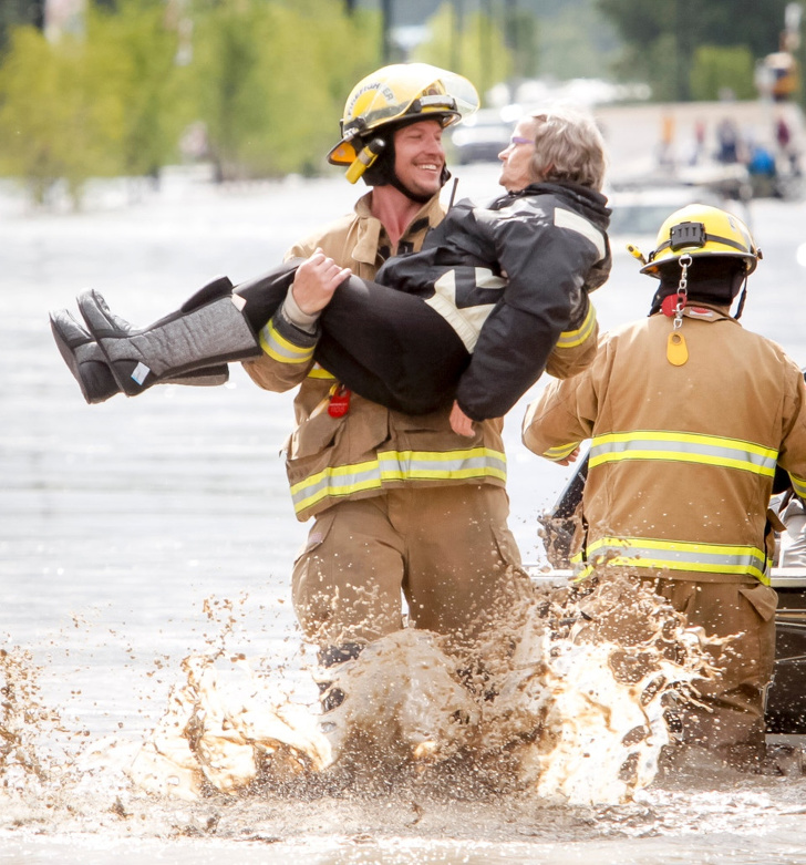 firefighter helping someone - Career