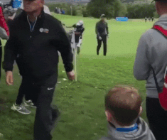 This kid just wanted a high-5 from his golf idol.