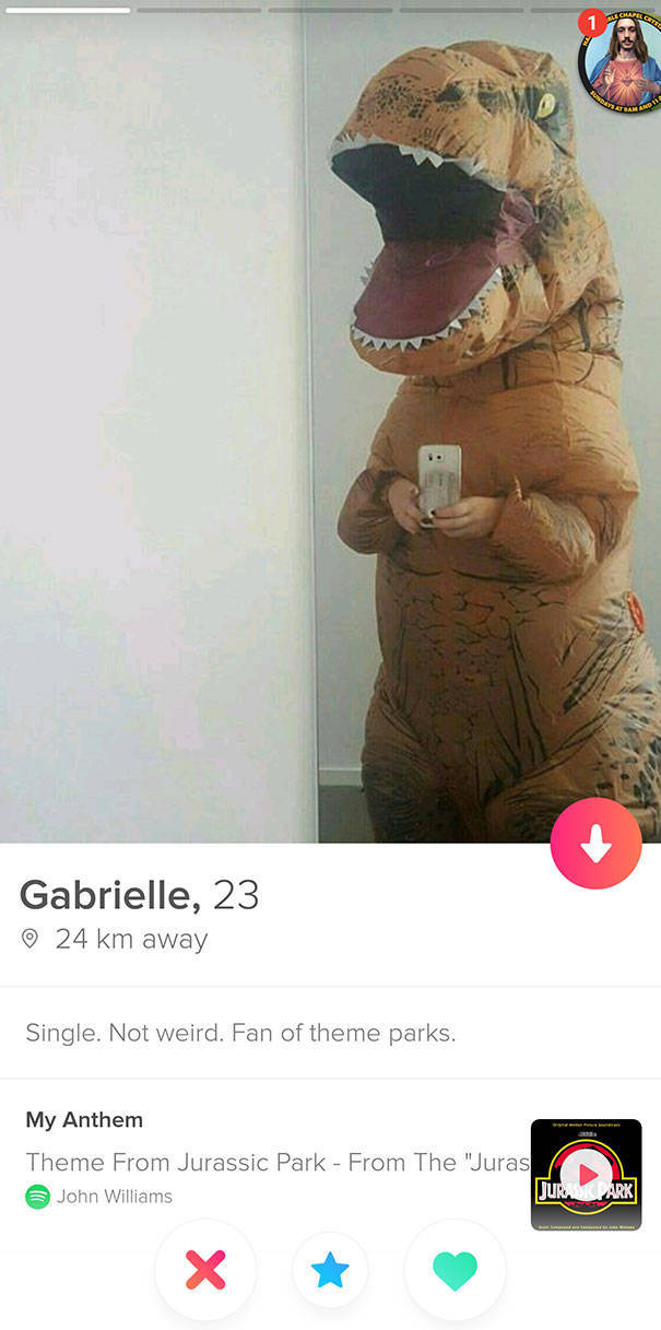 tinder - photo caption - Gabrielle, 23 24 km away Single. Not weird. Fan of theme parks. My Anthem Theme From Jurassic Park From The "Juras John Williams Det