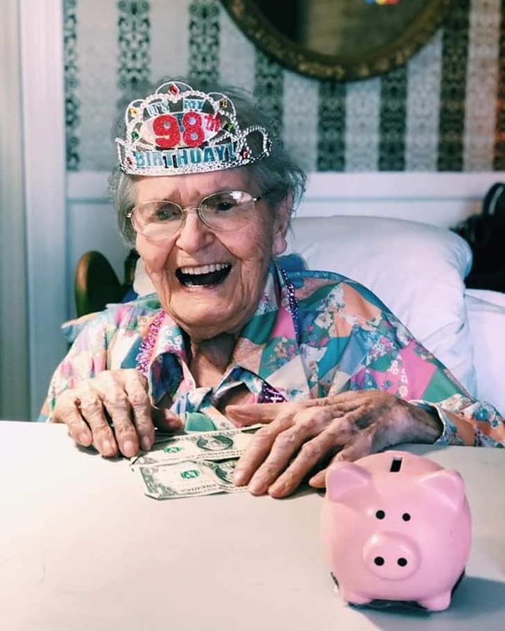 “This is my great grandma on her 98th birthday. My family brings her change all the time, because she absolutely loves putting it in her piggy bank. Well, this year she got cash for her piggy bank — look at that face. She is adorable.”