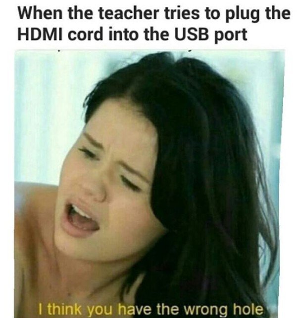 think you have the wrong hole - When the teacher tries to plug the Hdmi cord into the Usb port I think you have the wrong hole