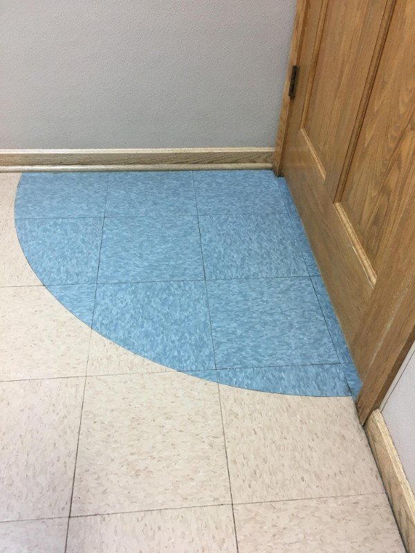 “This tile that lets you know if you’ll be hit by the opening door.”