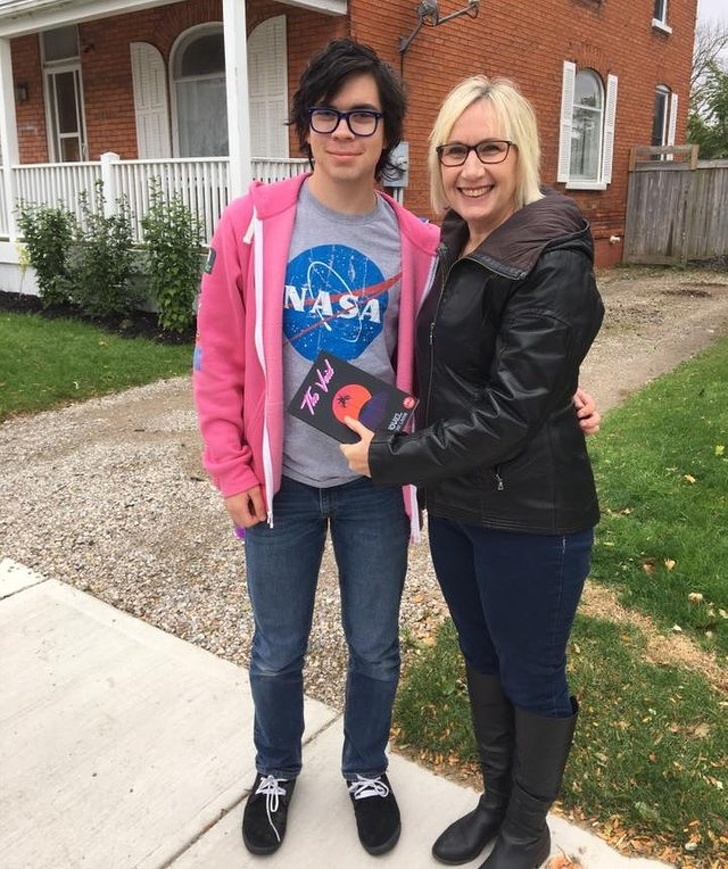 “My son has struggled with autism, Tourette’s, agoraphobia, severe anxiety, and OCD. He found solace in writing and just published his book on Amazon! Here he is giving a copy to one of his teachers that helped him along the way.”