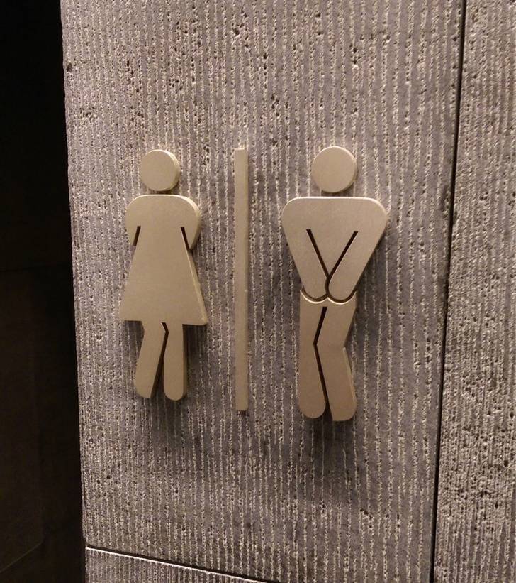 “The bathroom signs at my hotel are trying to hold it.”