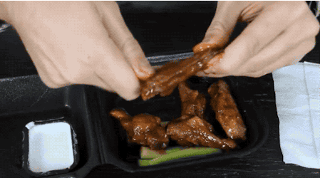 eat a flat chicken wing gif