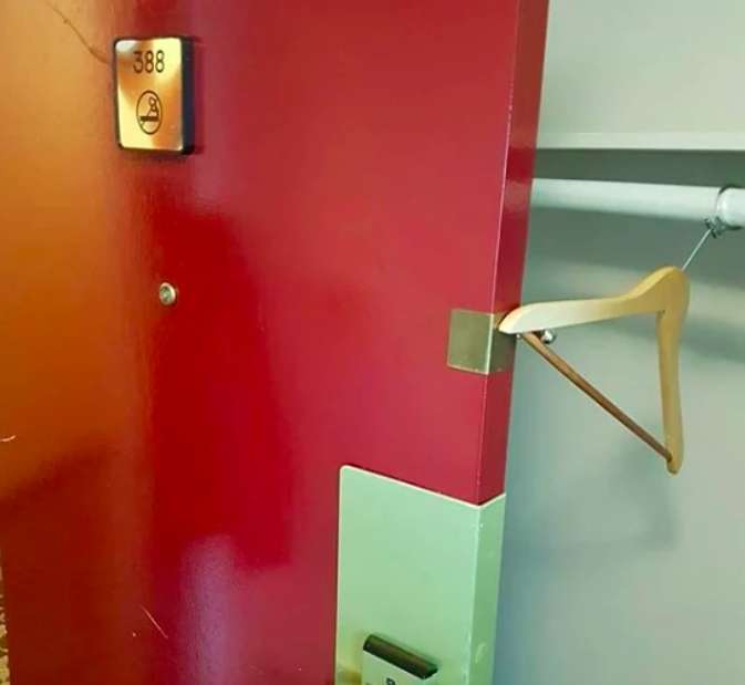 Attach a hanger to the hotel lock to keep the door open while you bring in your luggage.