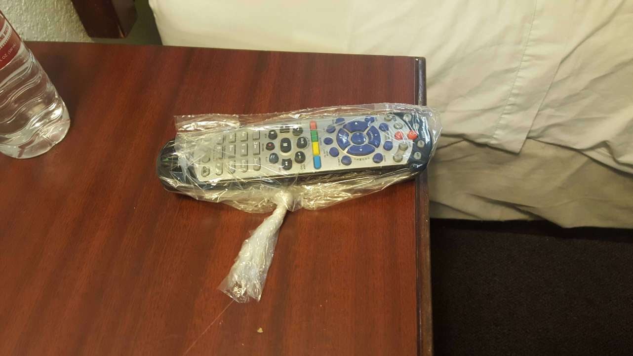 Hotel tv remotes get touched by a whole lot of people, and who knows how often that shit gets cleaned. If it grosses you out, use one of the little trash can liners to wrap it up.